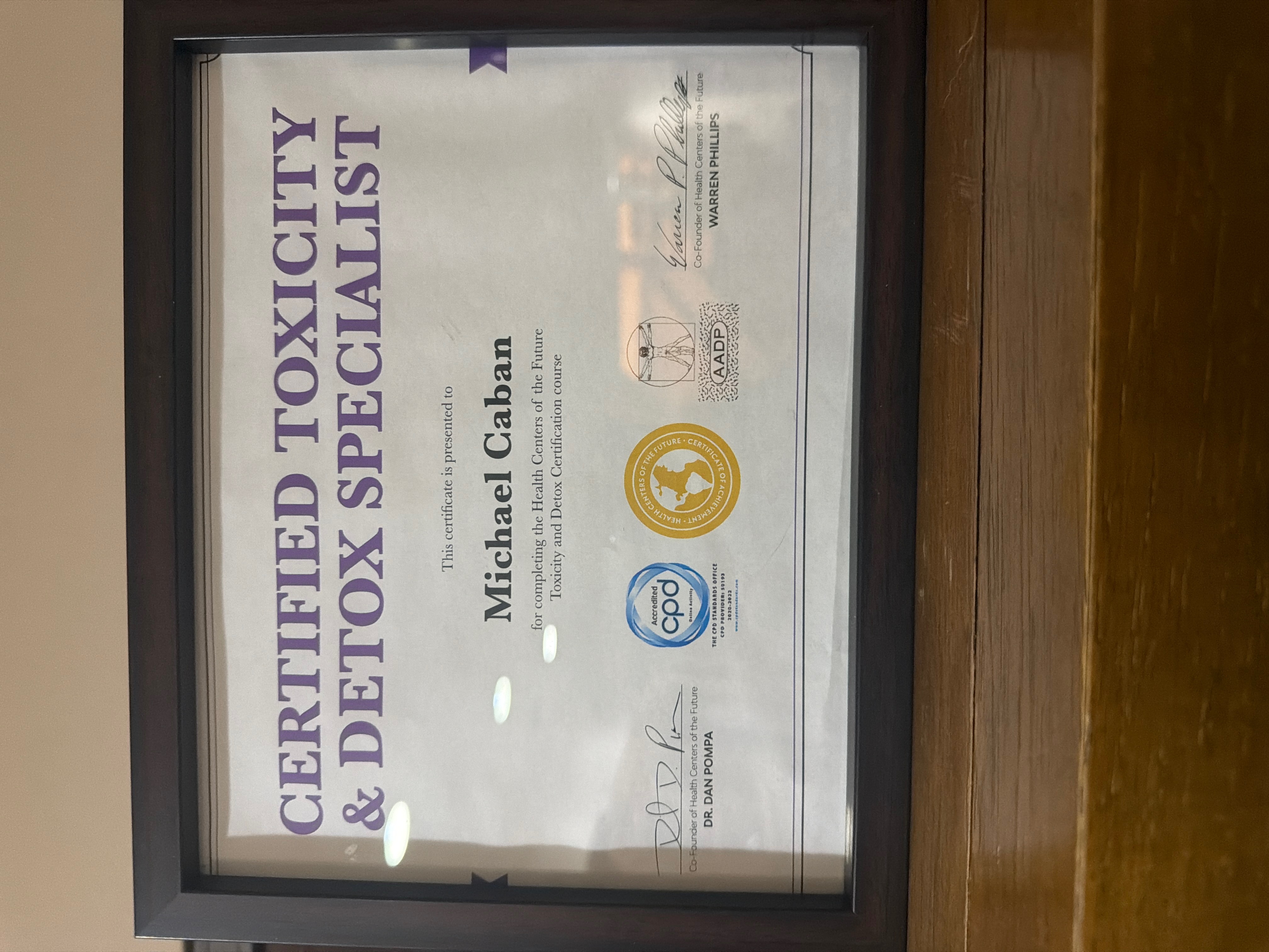 Certified Toxicity and Detox Specialist certificate issued to Michael Caban by Health Centers of the Future, signed by Dr. Dan Pompa and Warren Phillips, AADP and CPD accredited